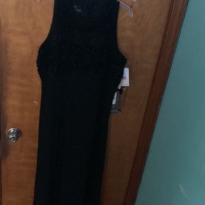 Black long flowey dress | patterns on the top |